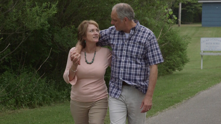 A husband and wife walk together