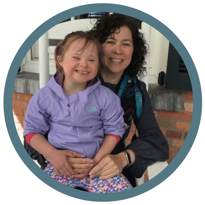 Janet and Amelia sit together on their front porch